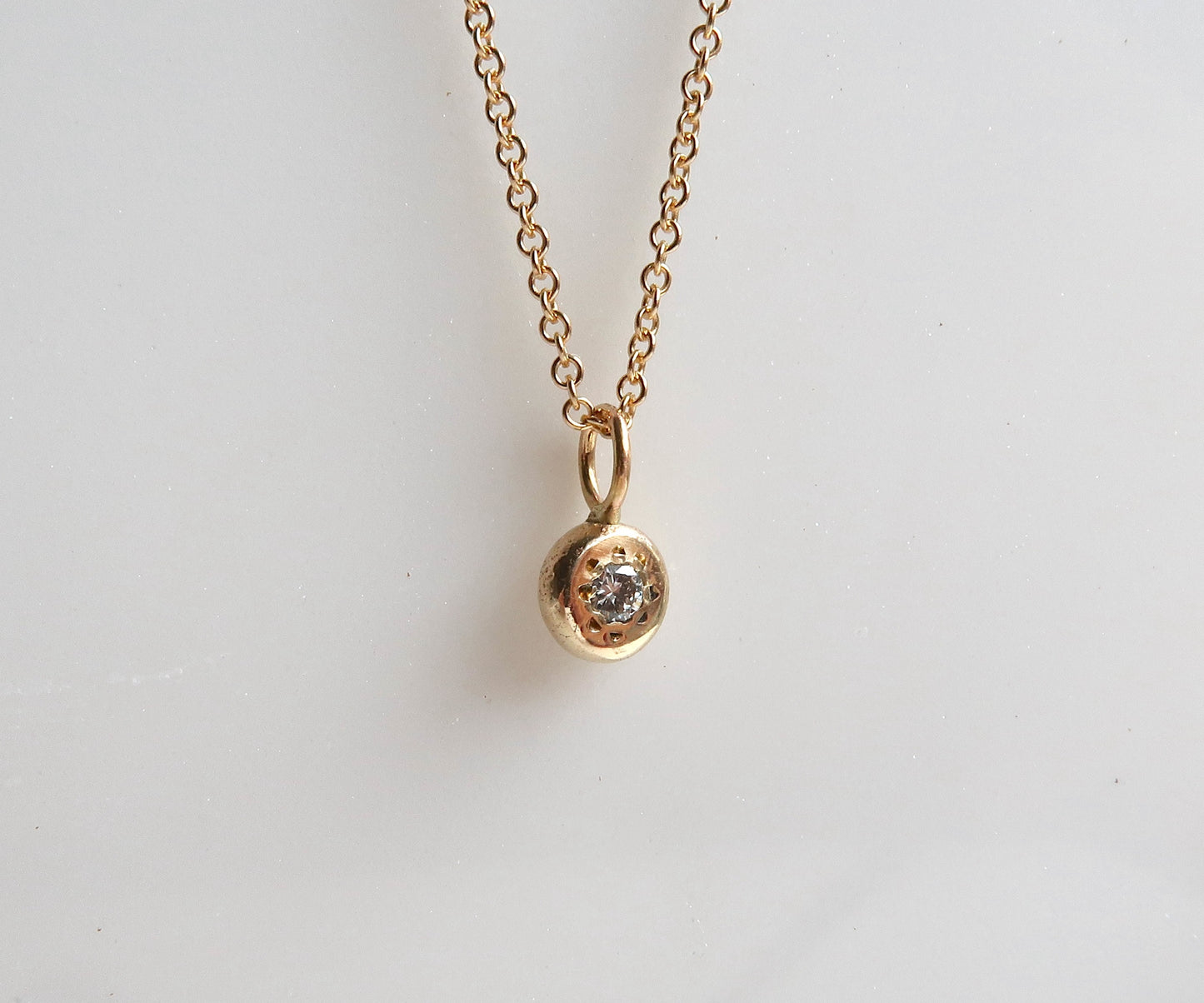 Diamond yellow gold disc necklace