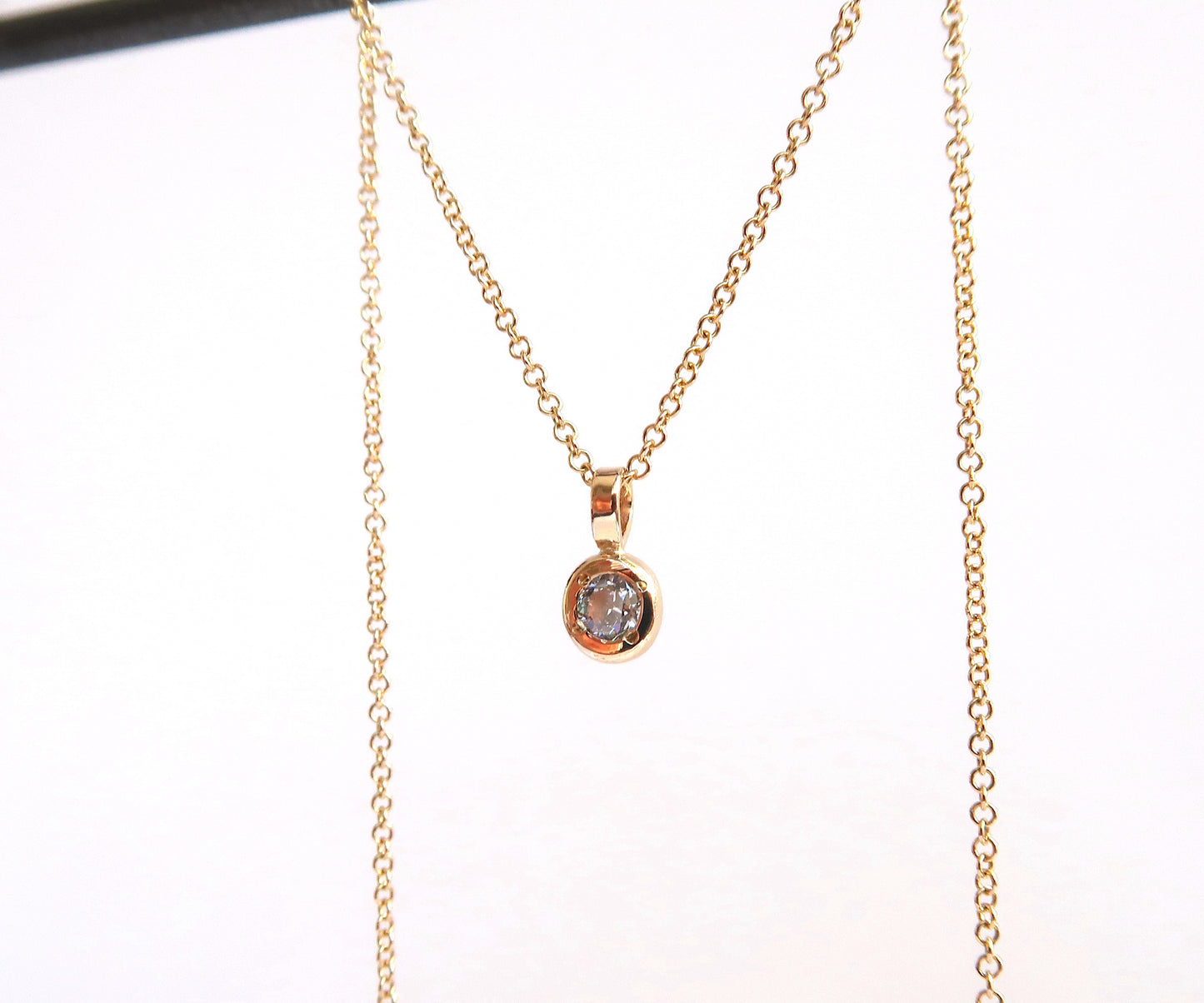 Diamond gold pendant on chain