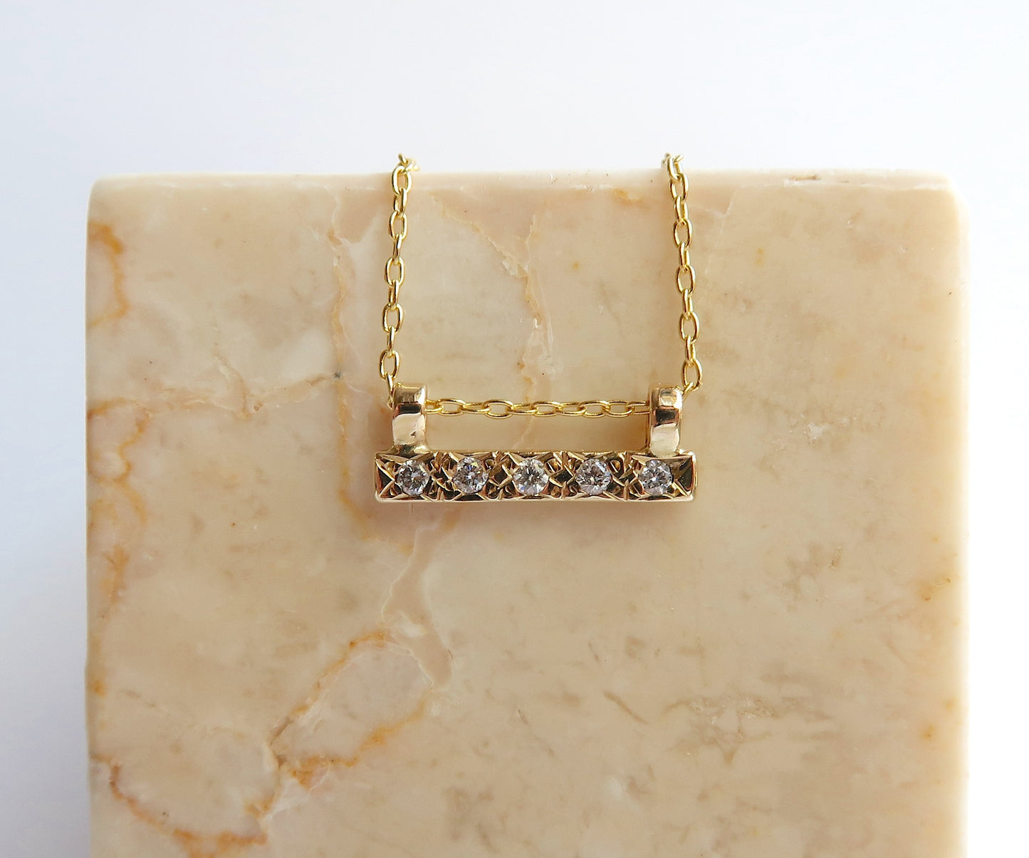 Diamond bar necklace yellow gold