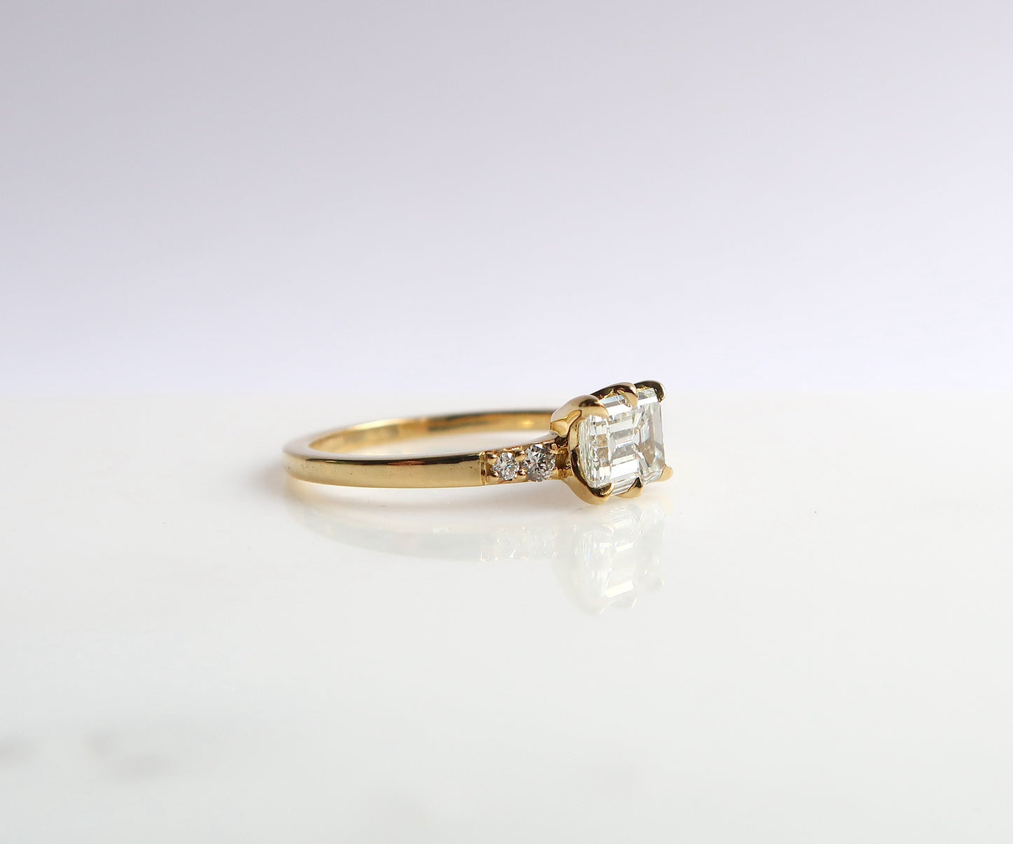 Nishi Emerald Cut Diamond Ring in Yellow Gold
