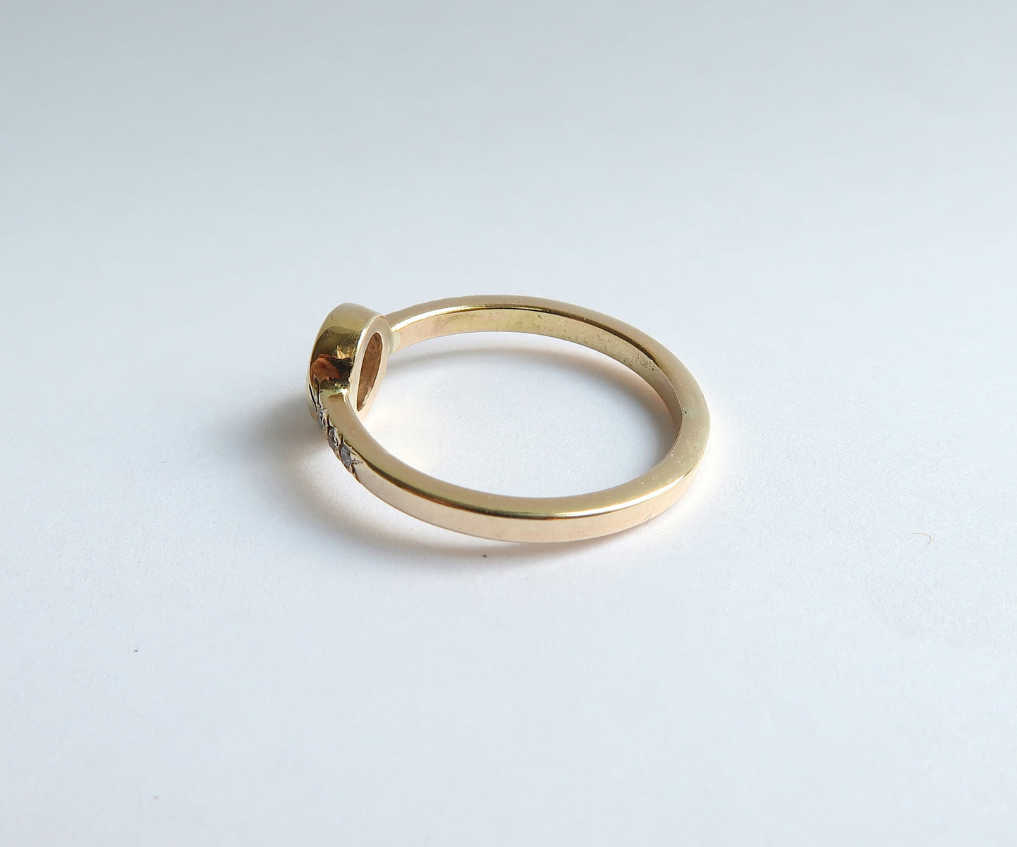 Bezel set rose cut diamond ring in yellow gold