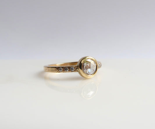 Bezel set rose cut diamond ring in yellow gold