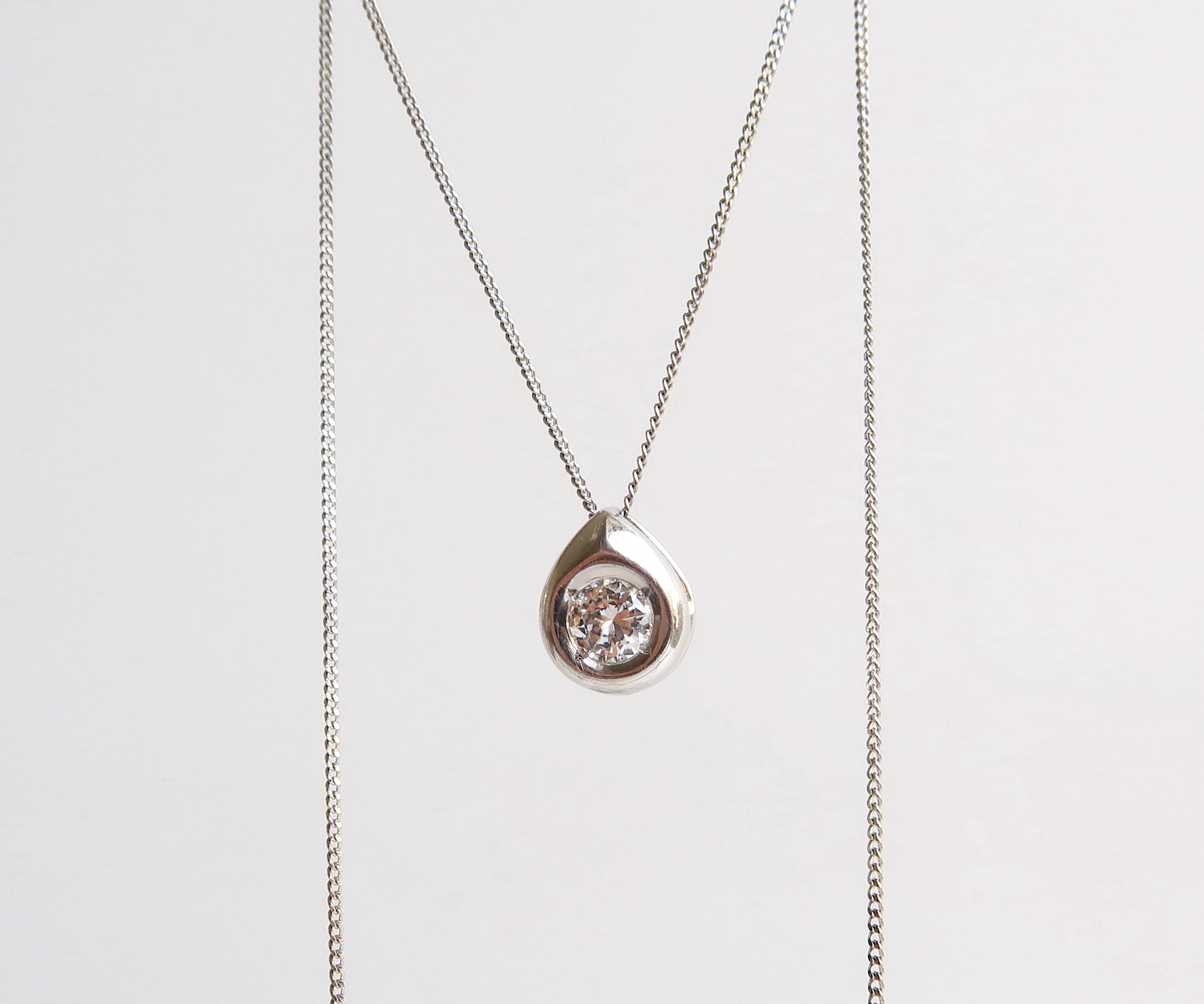 Nishi platinum diamond pendant necklace