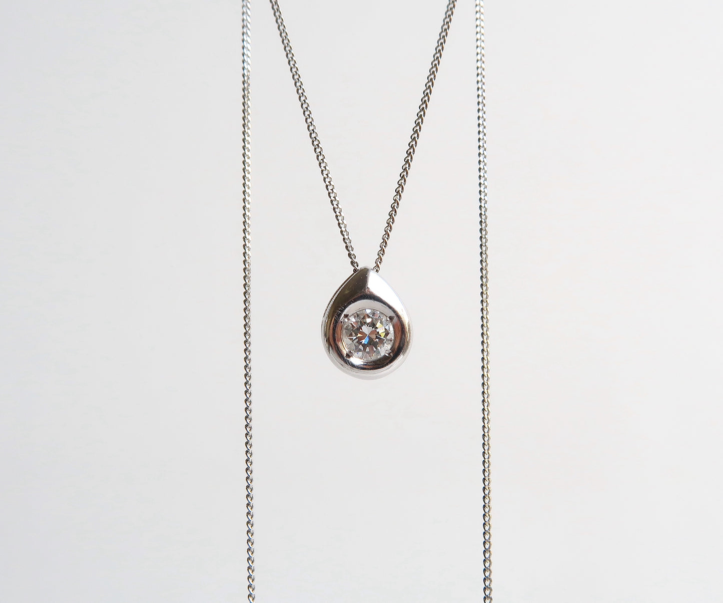 Nishi platinum diamond pendant necklace