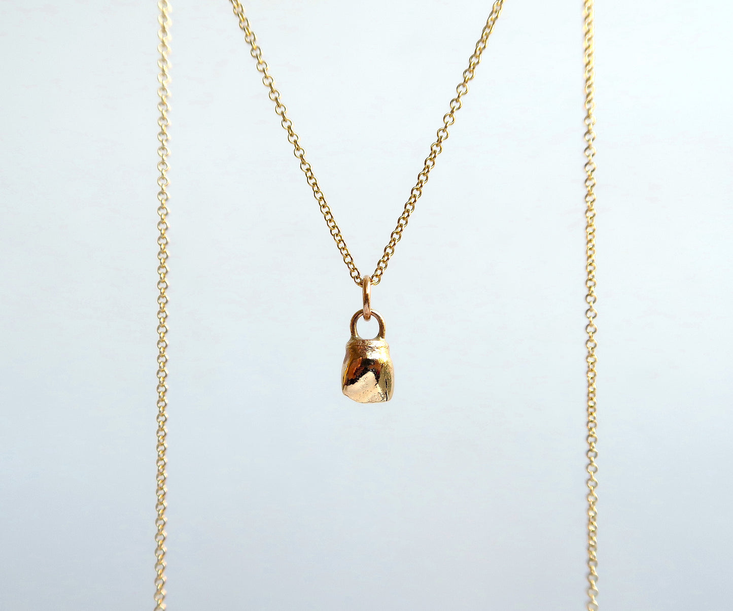 Nishi baby tooth necklace