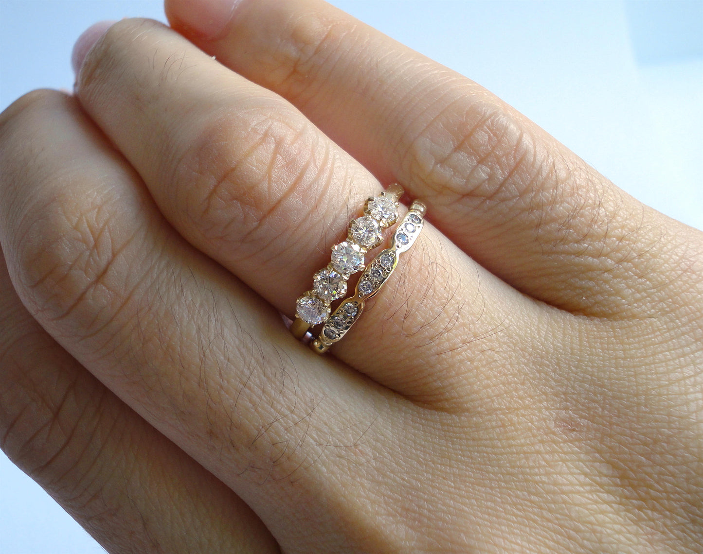 Nishi 5 stone diamond knife edge ring