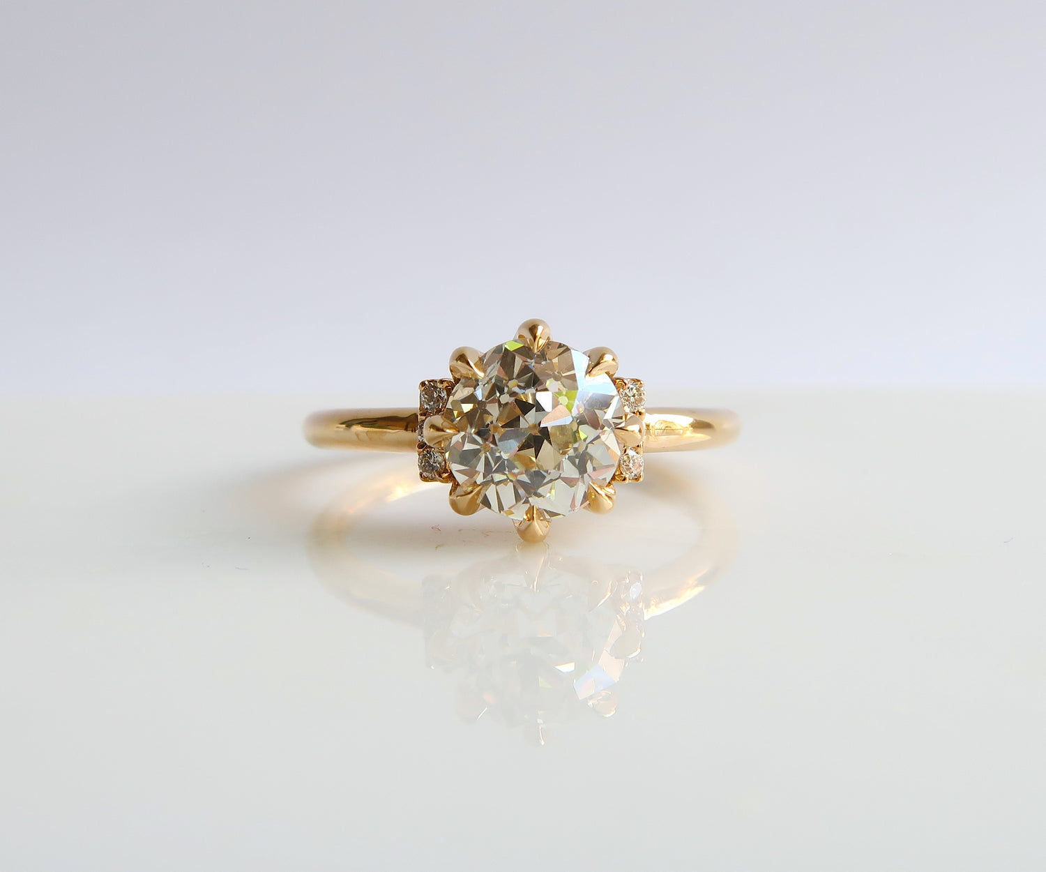 Eight prong old European cut diamond ring in yellow gold