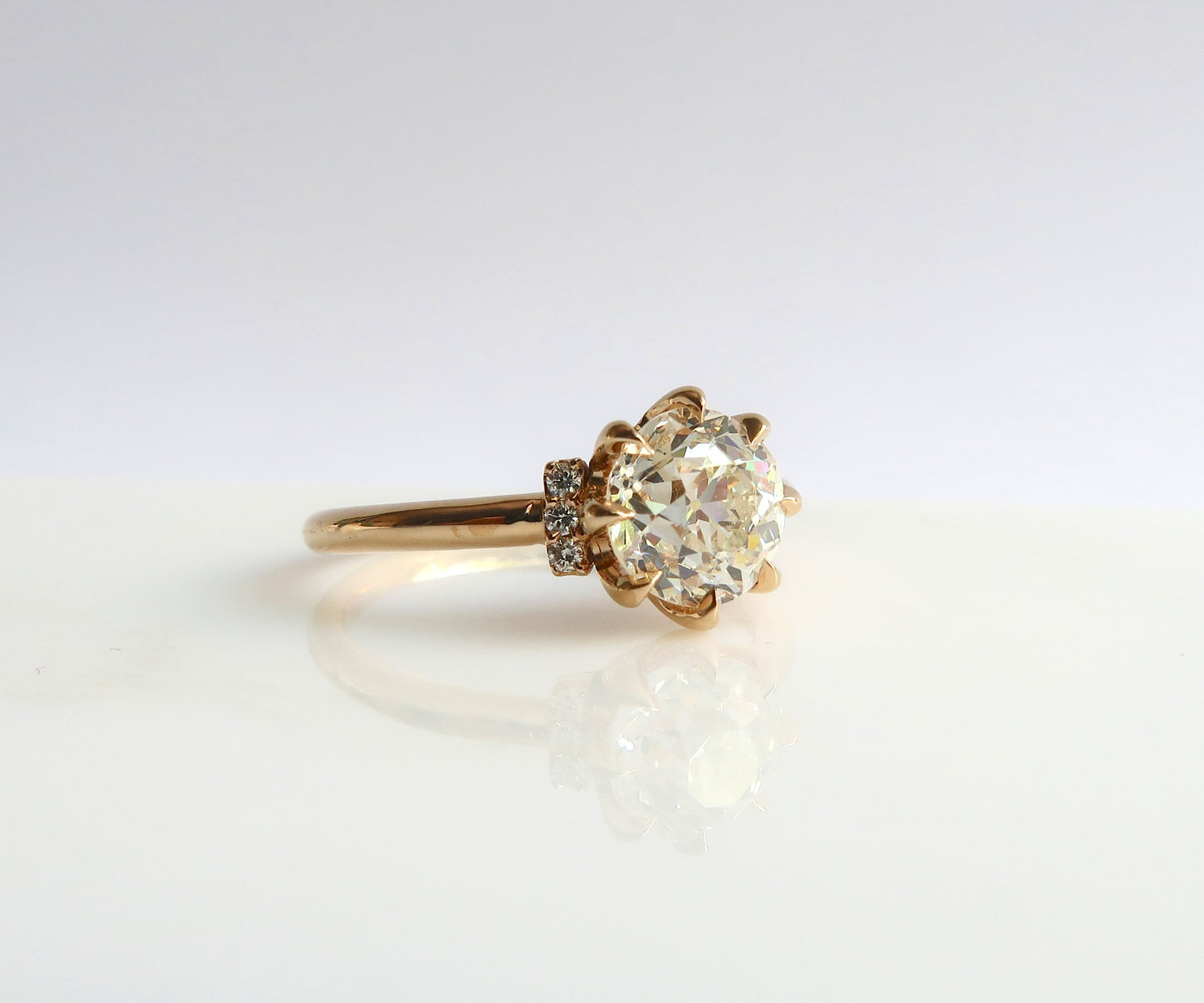 Eight prong old European cut diamond ring in yellow gold