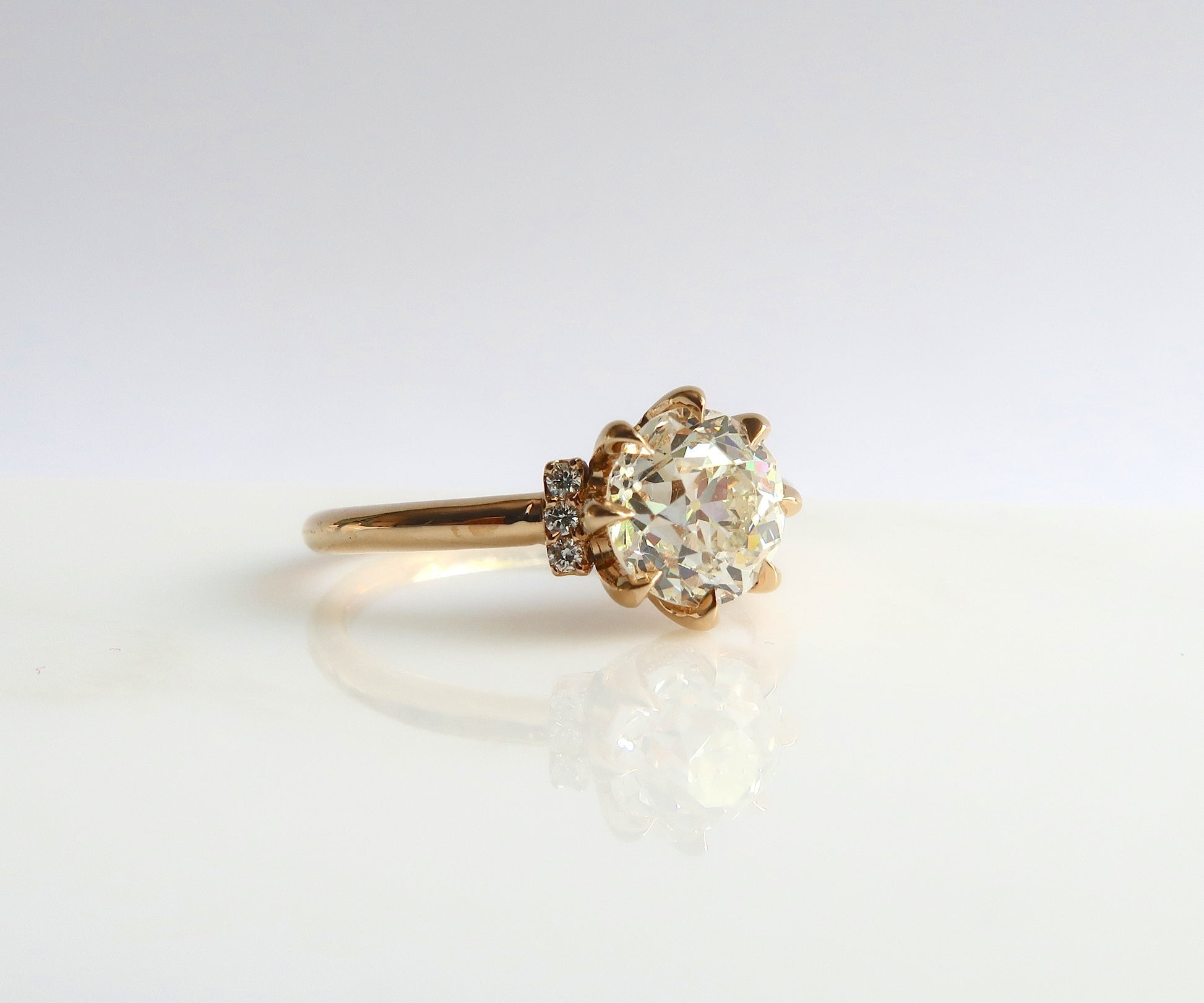 Eight prong old European cut diamond ring in yellow gold