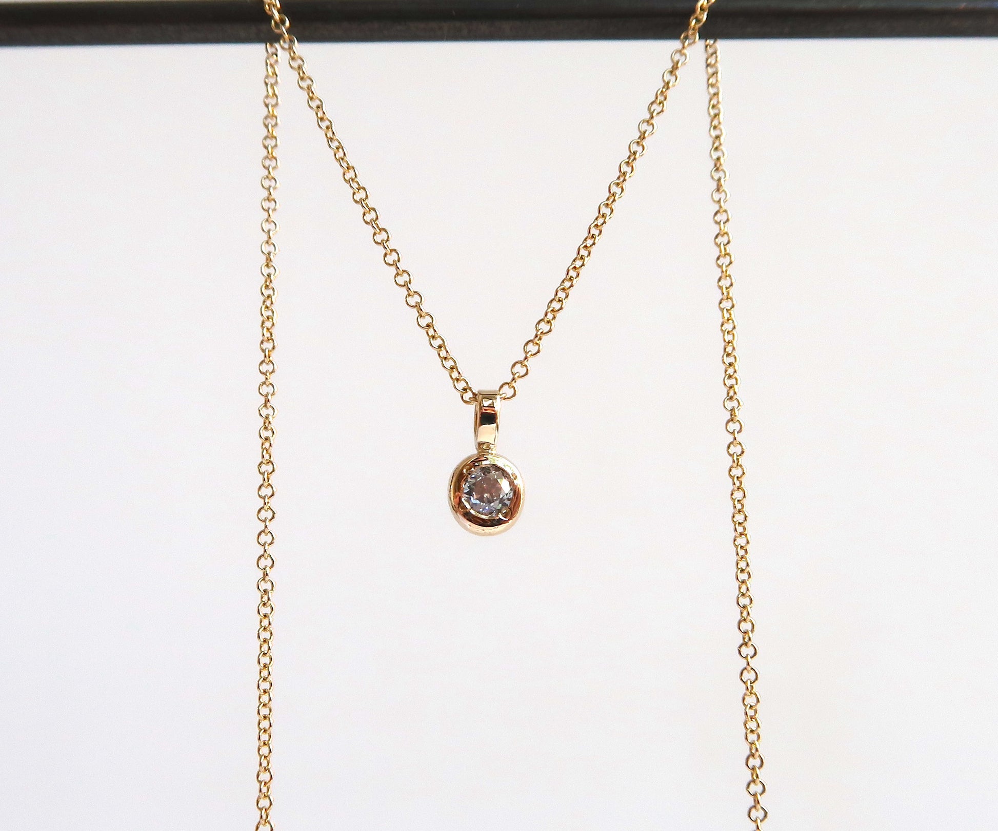 Diamond gold pendant on chain
