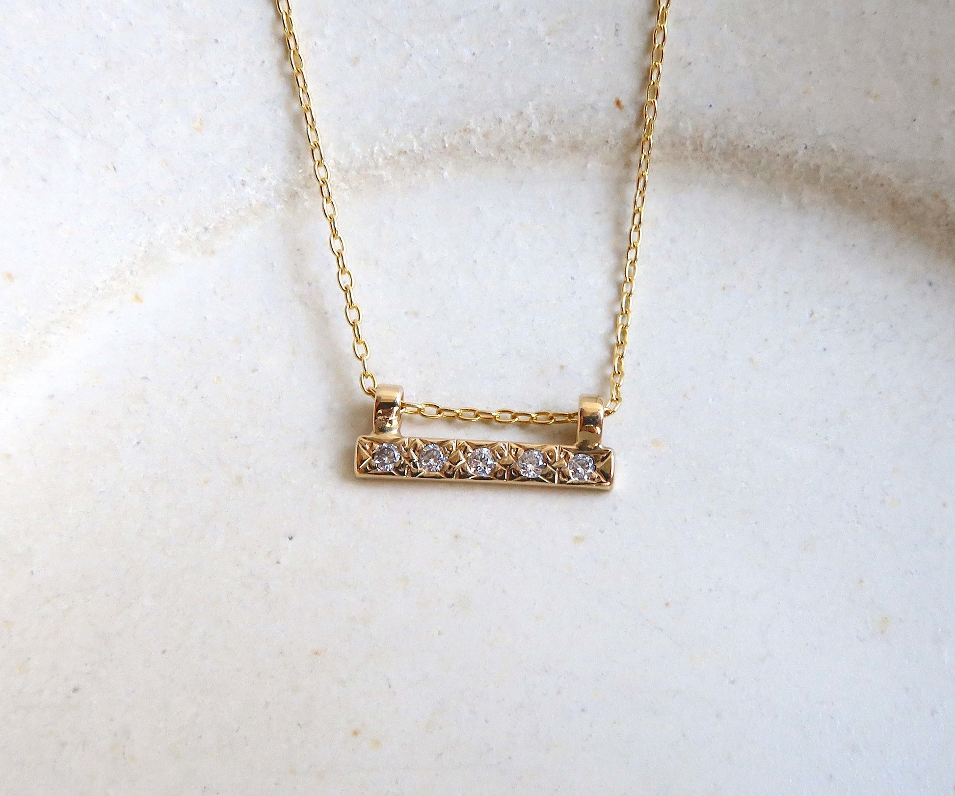 Diamond bar necklace yellow gold