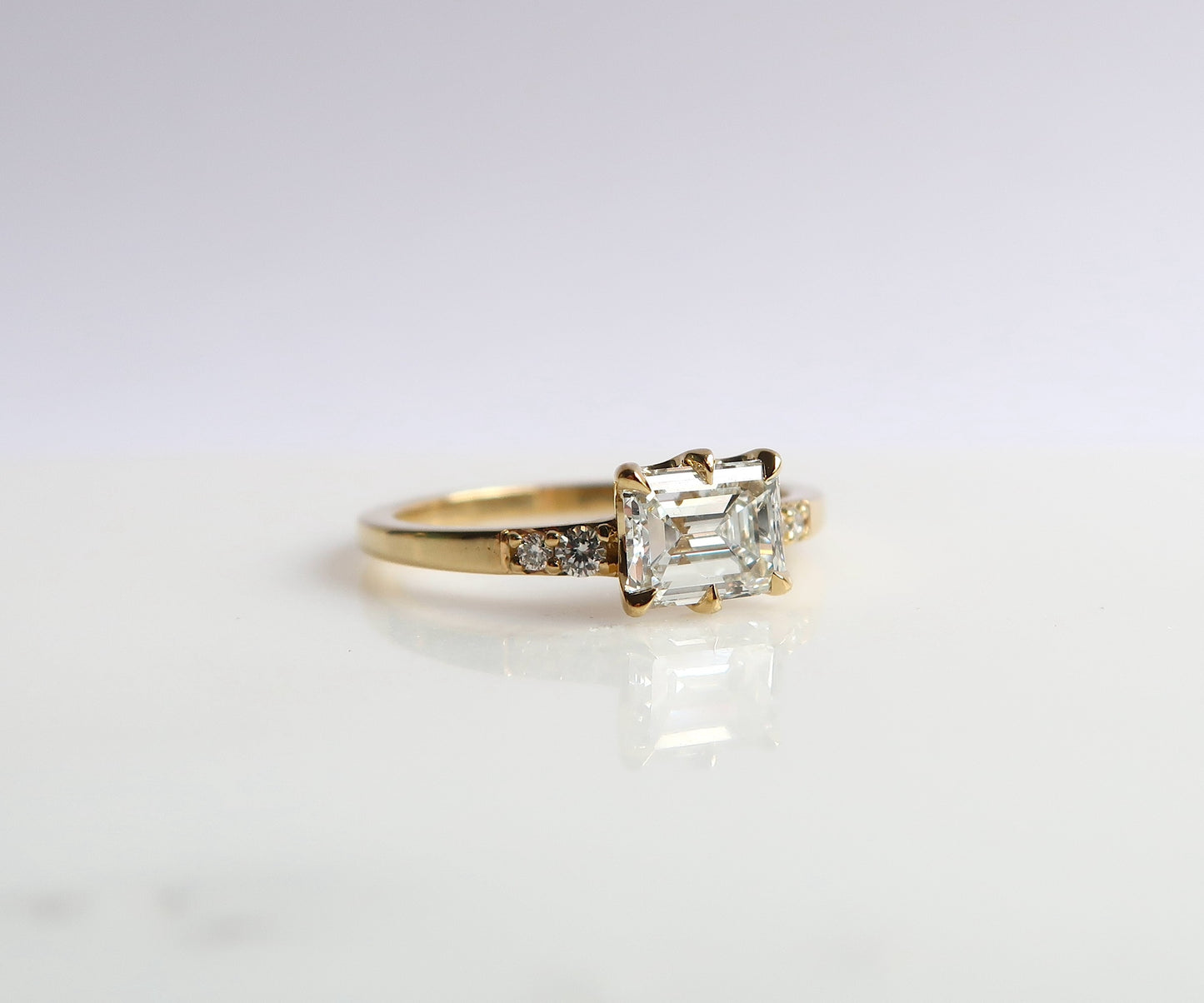 Nishi Emerald Cut Diamond Ring in Yellow Gold