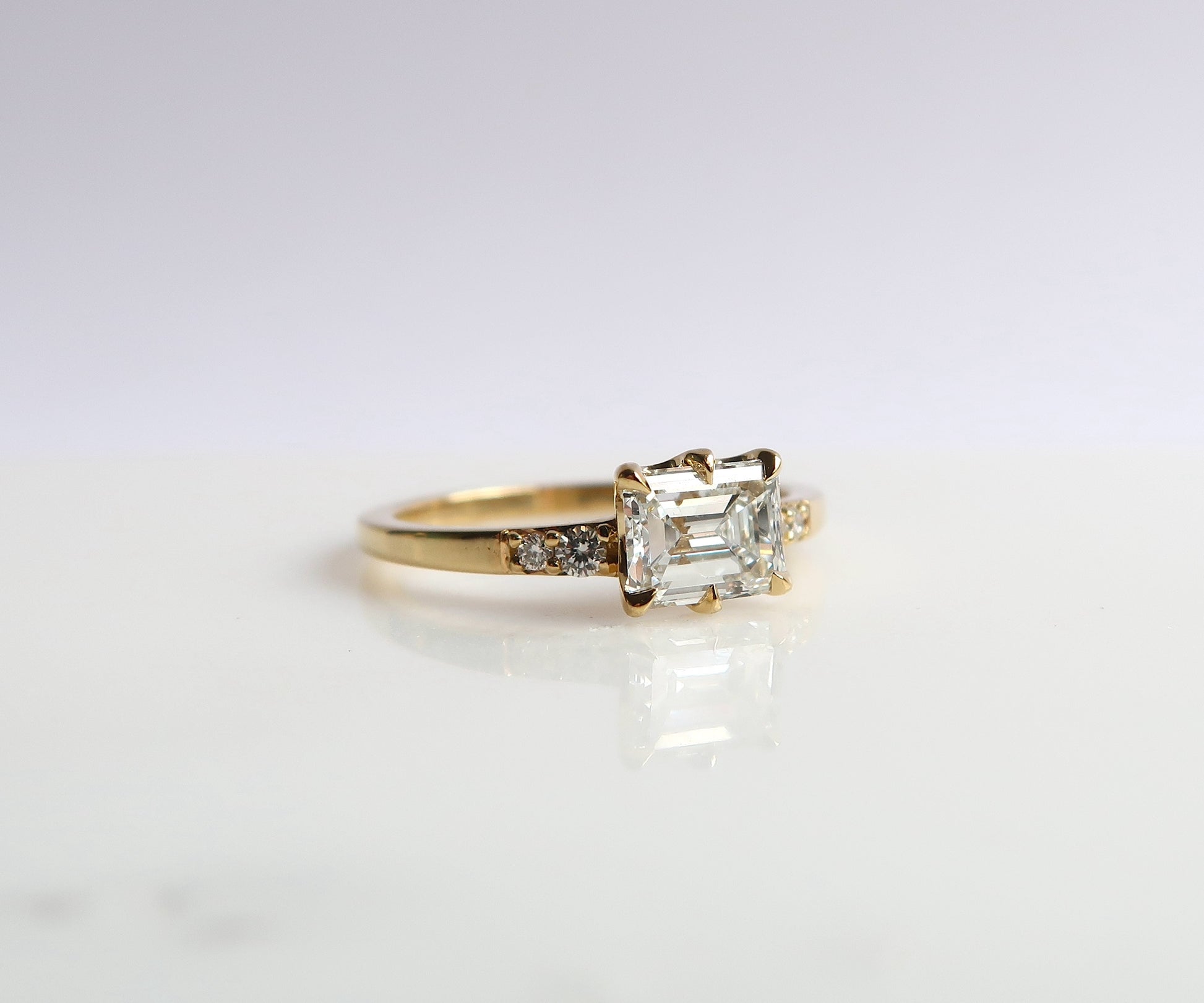 Nishi Emerald Cut Diamond Ring in Yellow Gold