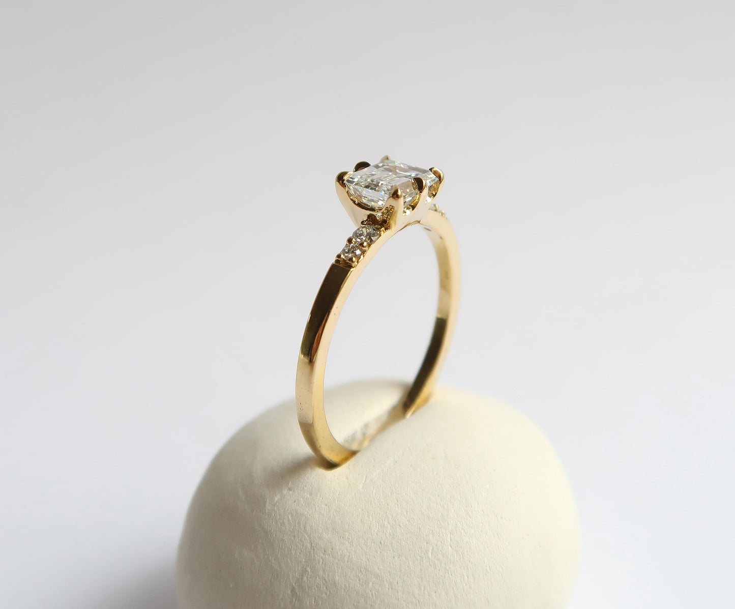 Nishi Emerald Cut Diamond Ring in Yellow Gold