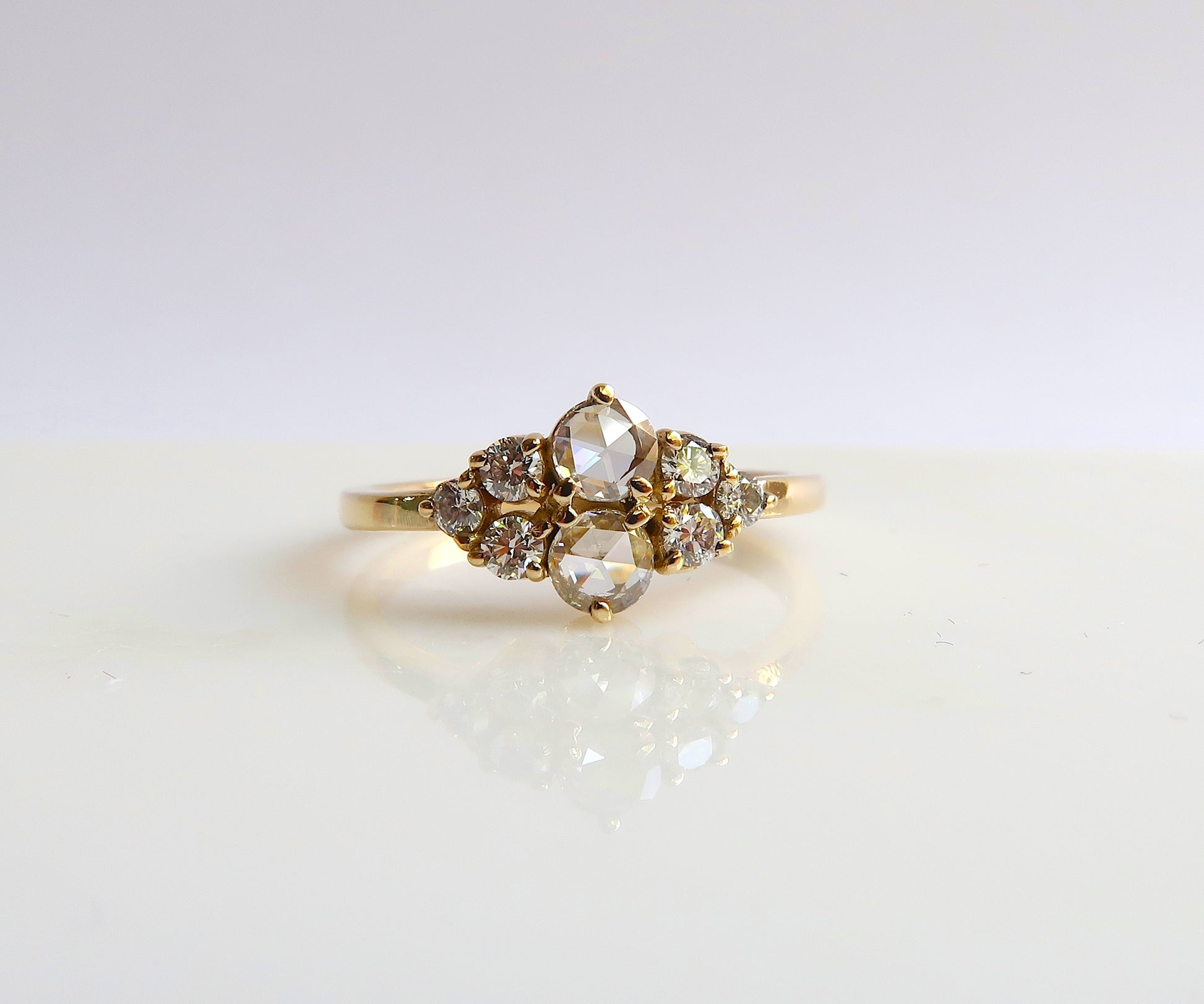 Rose cut diamond cluster ring in yellow gold