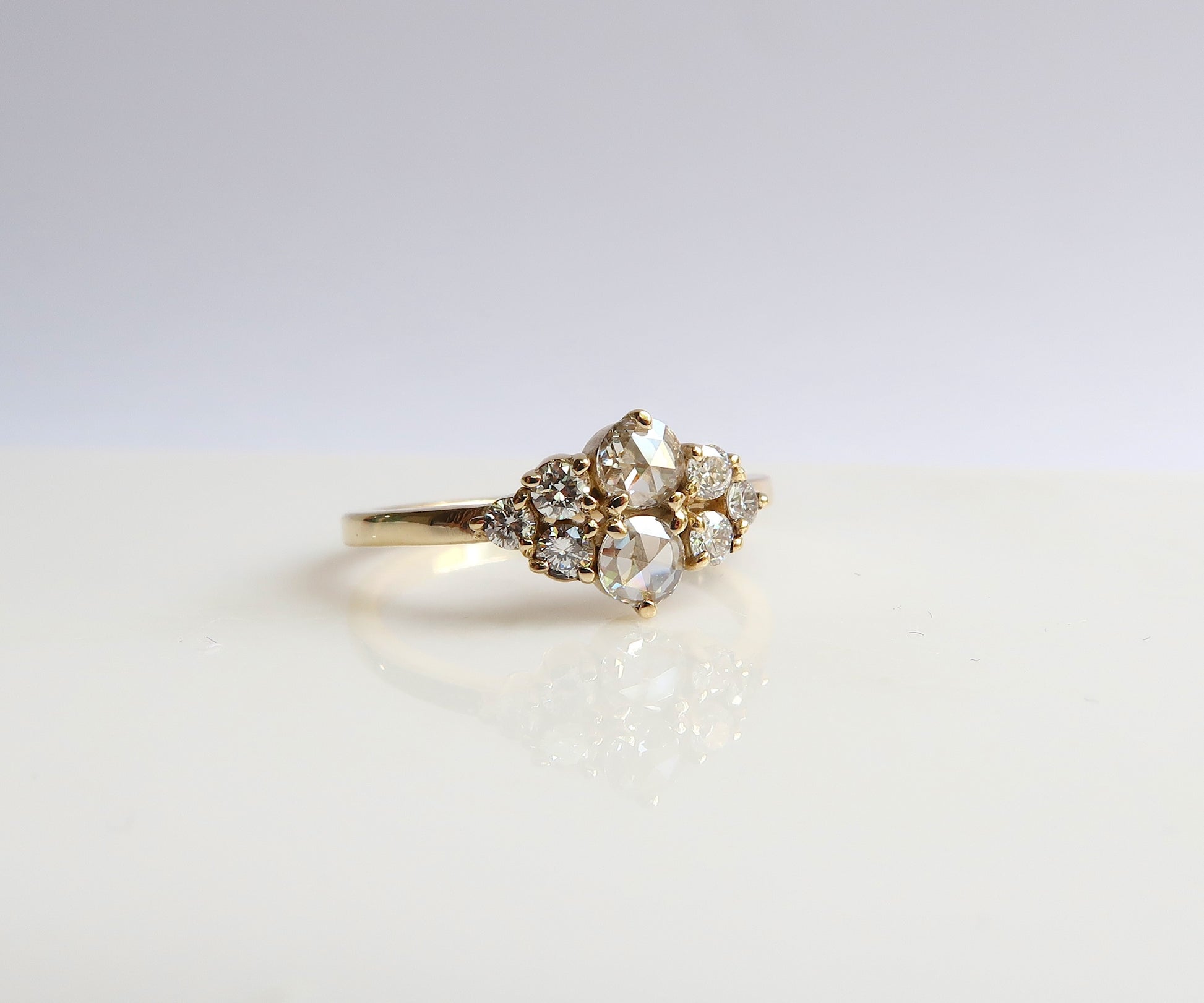 Rose cut diamond cluster ring in yellow gold
