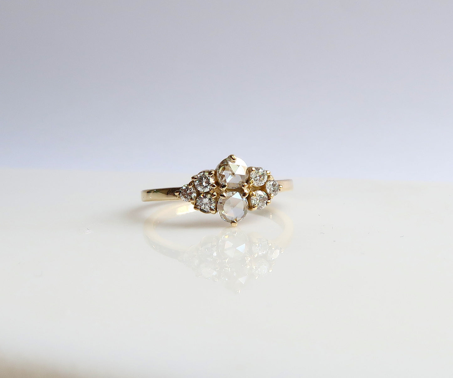 Rose cut diamond cluster ring in yellow gold