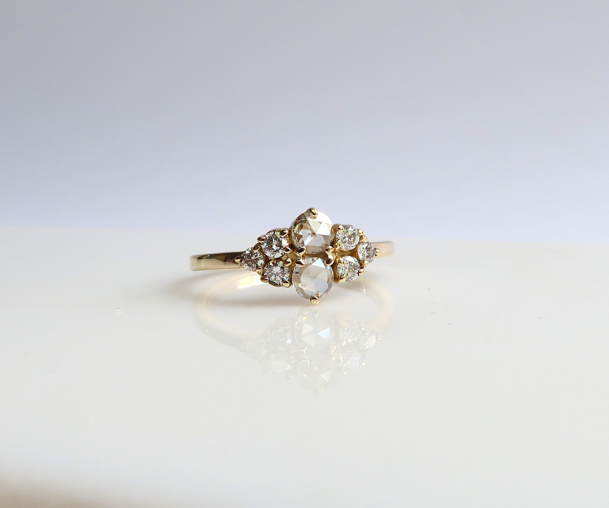 Rose cut diamond cluster ring in yellow gold