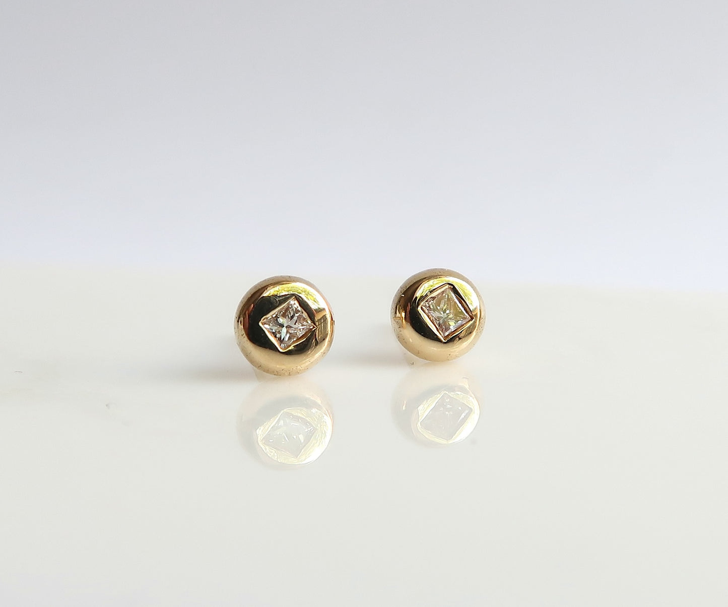 Round Diamond Studs with Square Cut Diamonds