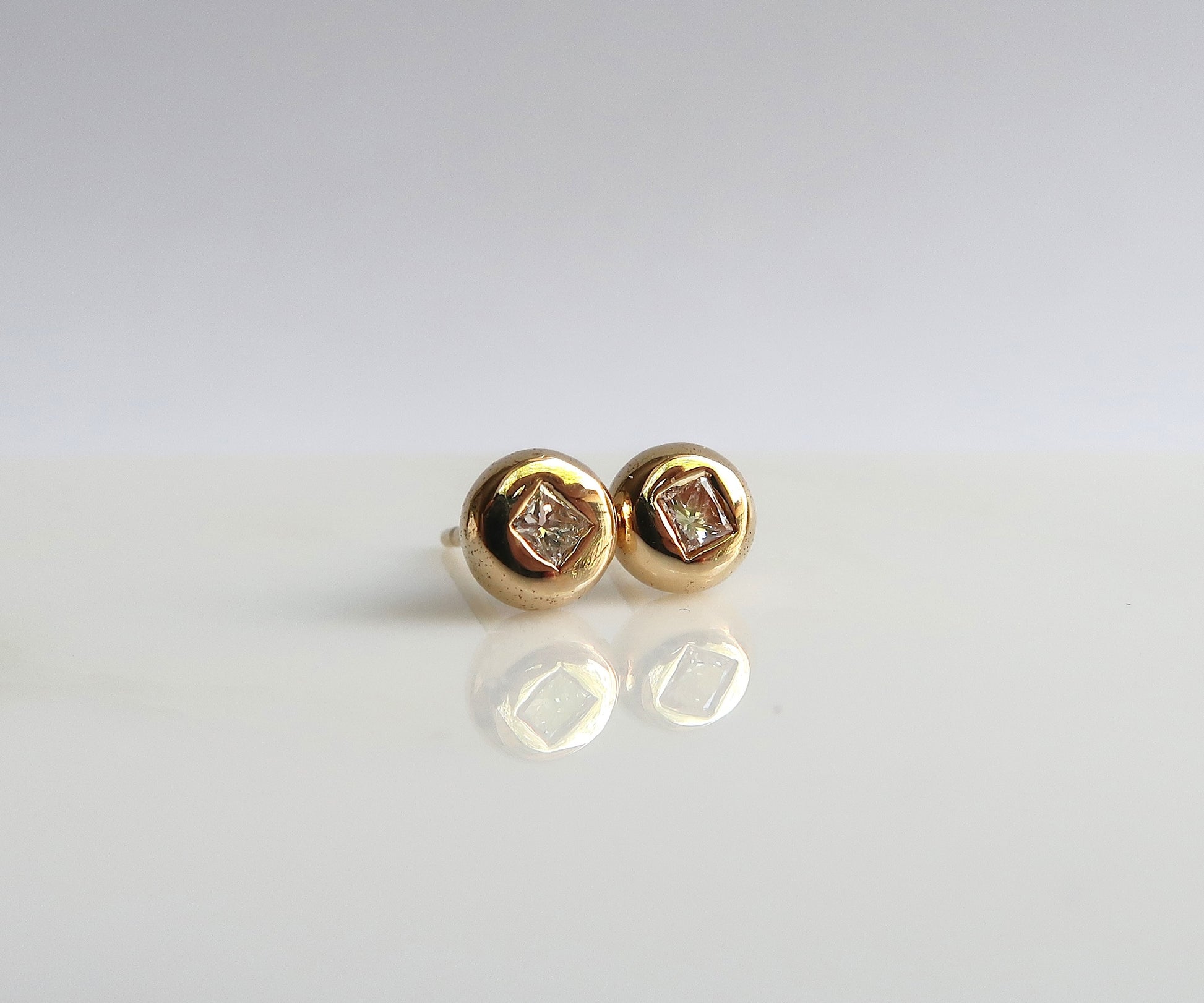Round Diamond Studs with Square Cut Diamonds