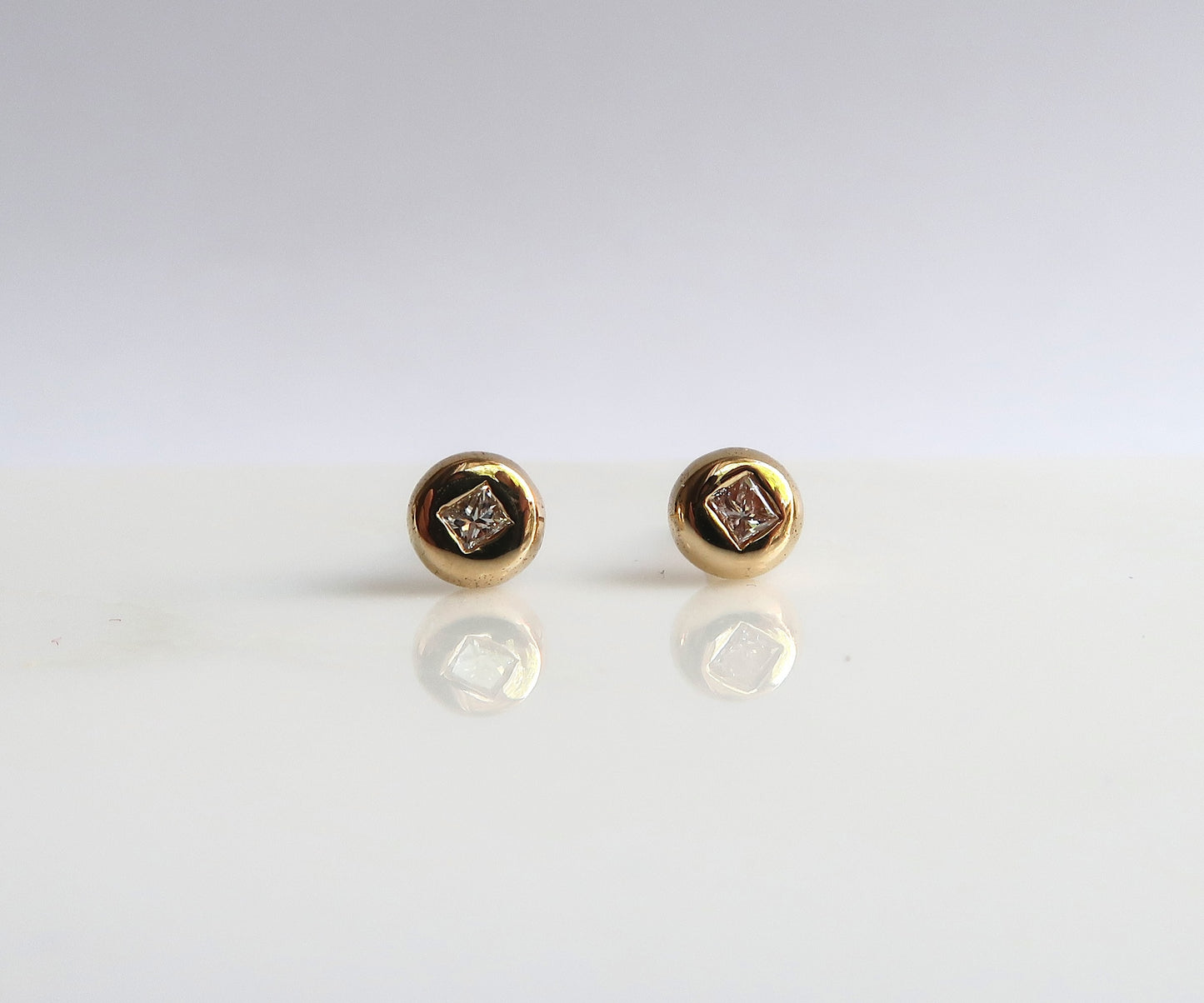 Round Diamond Studs with Square Cut Diamonds