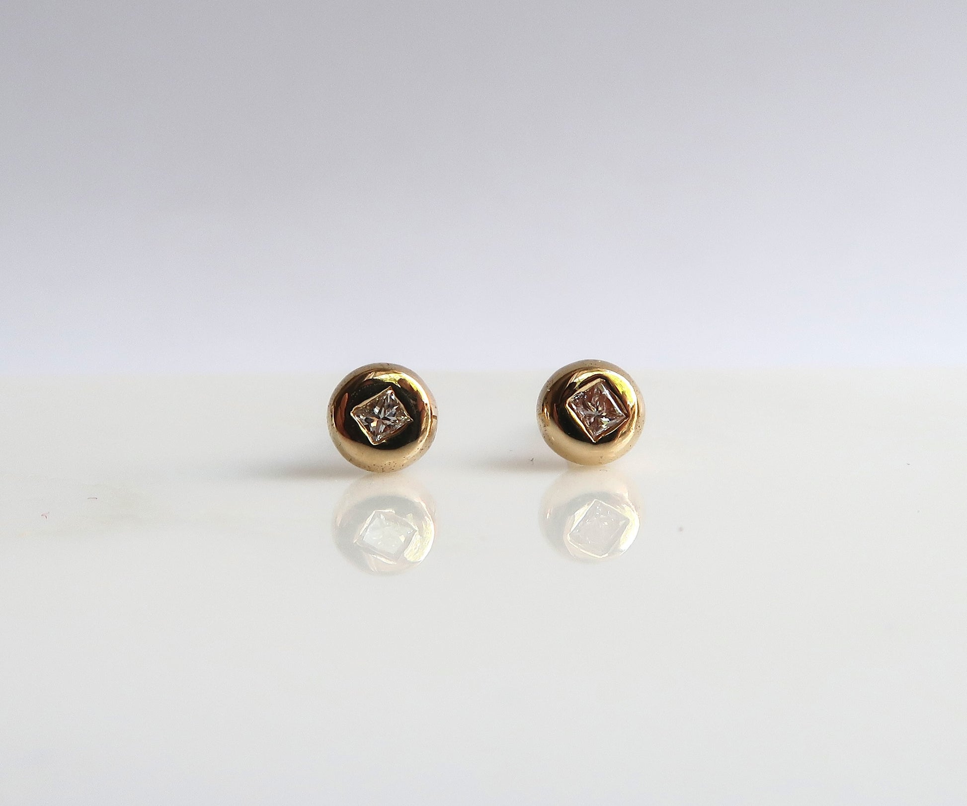 Round Diamond Studs with Square Cut Diamonds