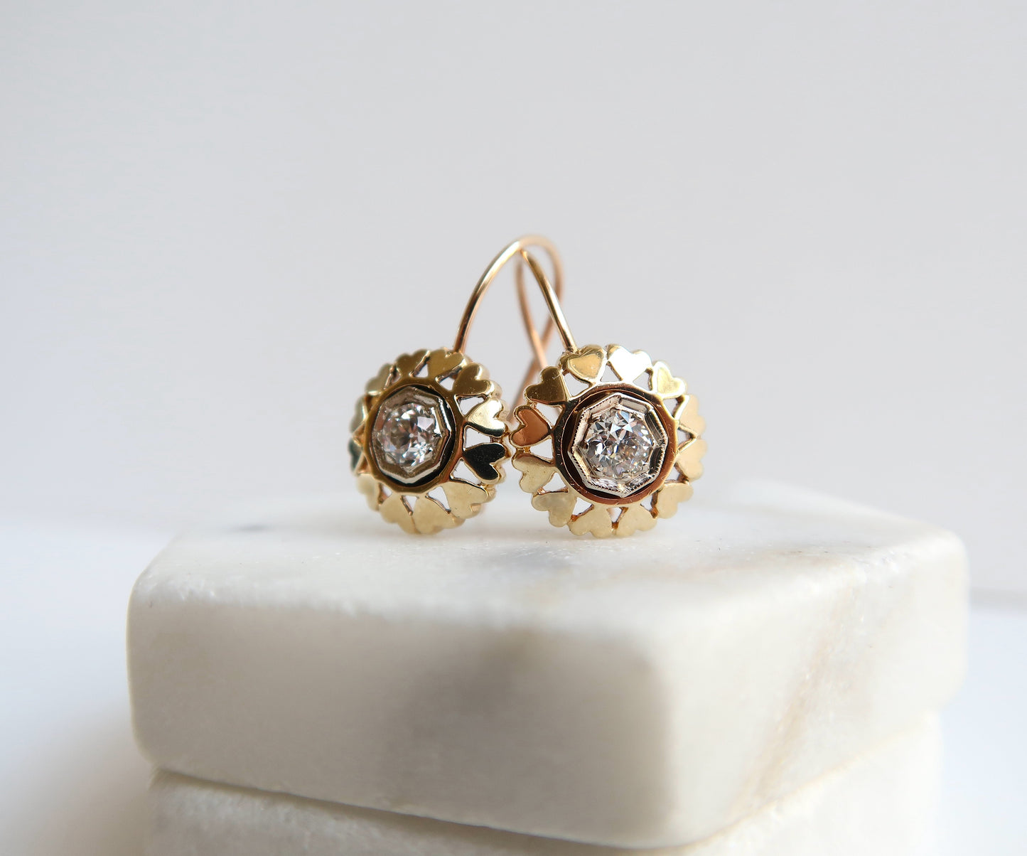 Diamond and Gold Earrings with heart cut outs