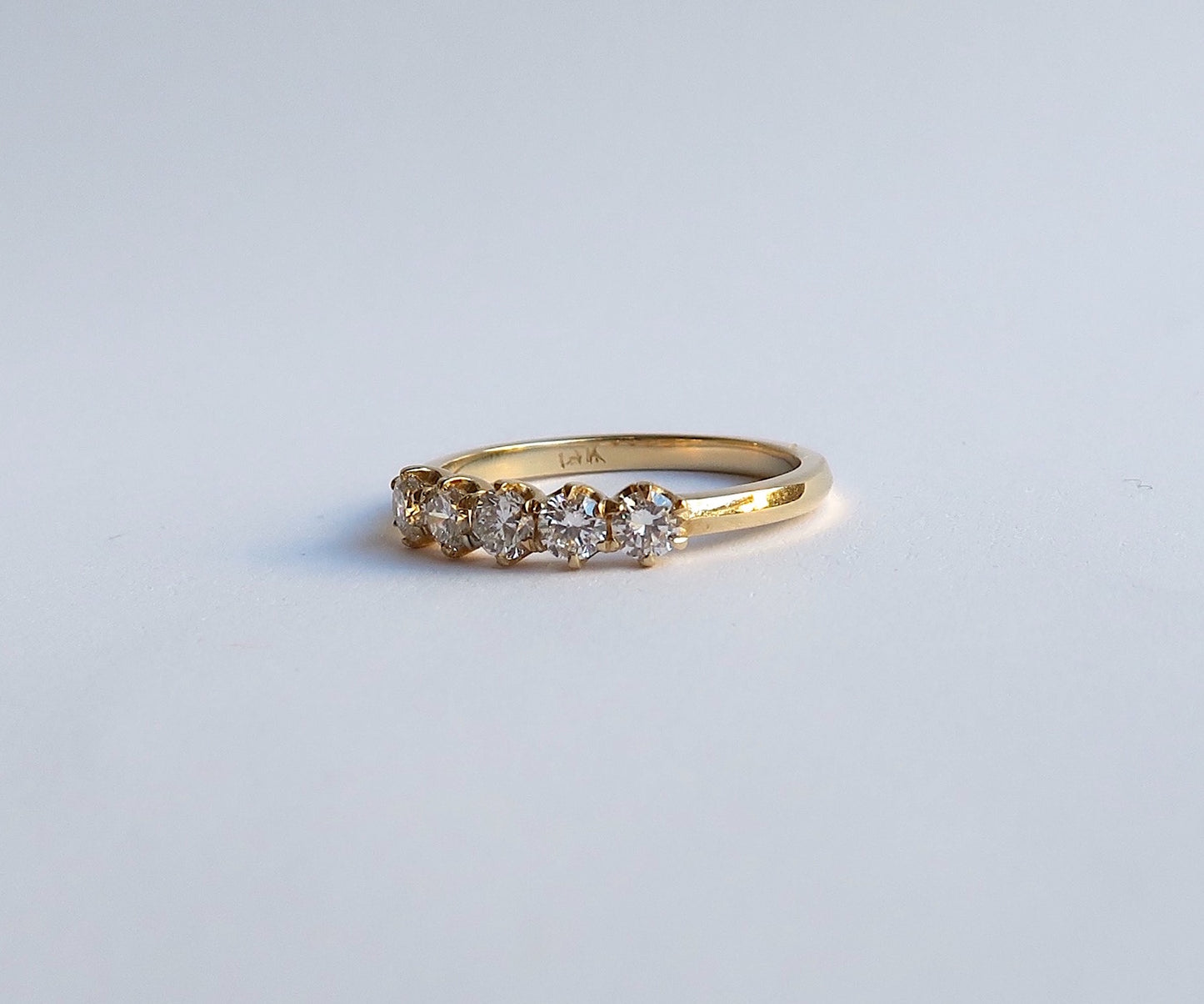 Nishi 5 stone diamond knife edge ring