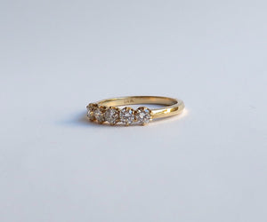 Nishi 5 stone diamond knife edge ring