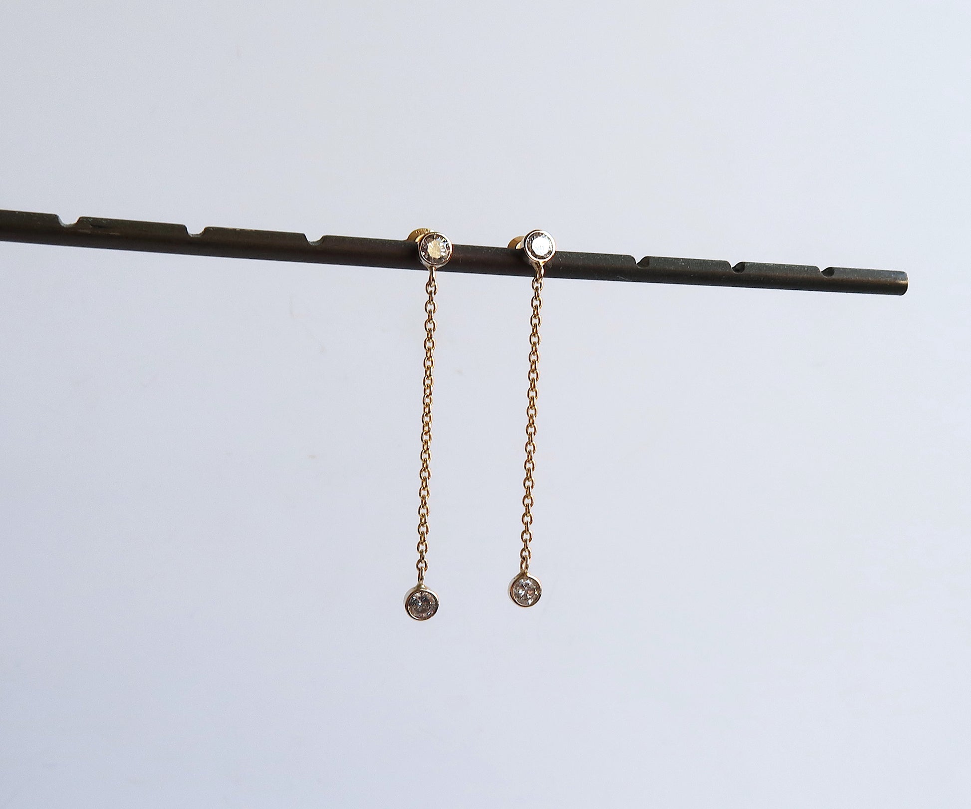 Nishi bezel set diamond chain link earrings