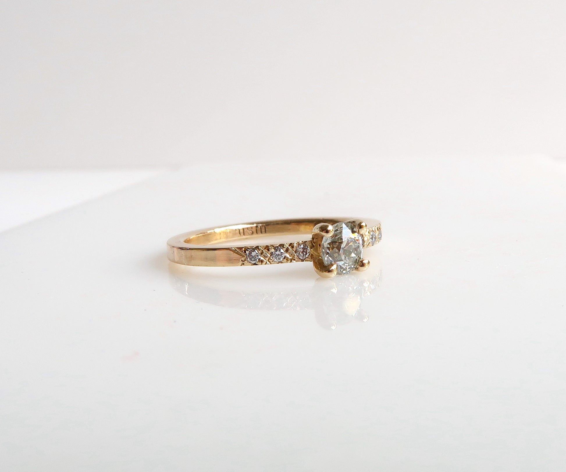 Nishi old european cut diamond solitaire