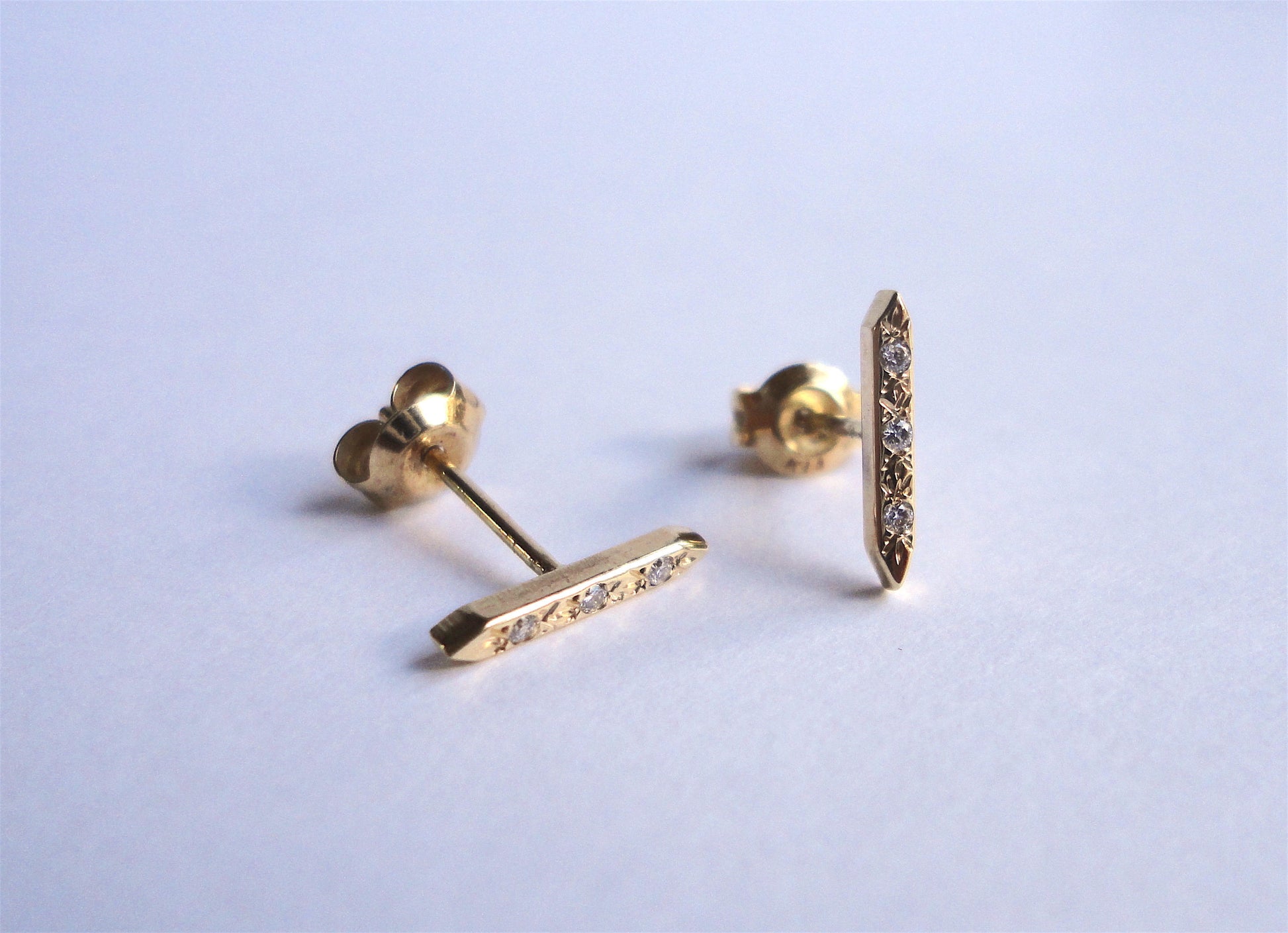 Nishi Diamond Arrow Gold Studs